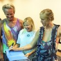 Bethany Hamilton signs copies of her book at the premiere of her documentary "Unstoppable" at Lemoore's Stadium Cinemas.